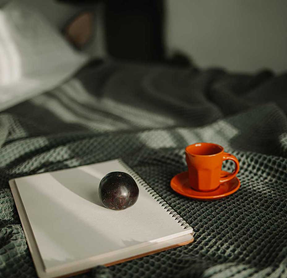 Fresh coffee on bed