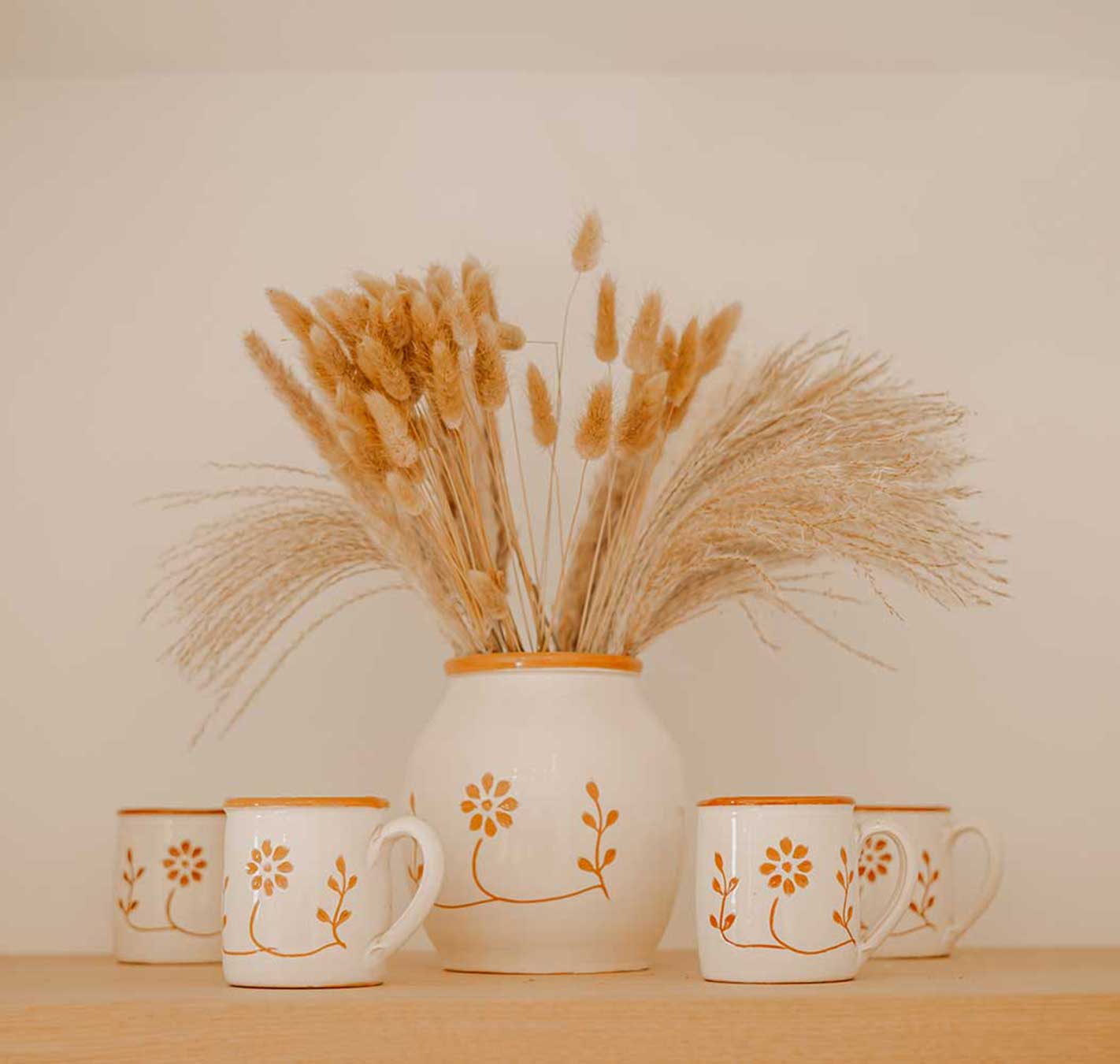 Ceramic jug with glasses